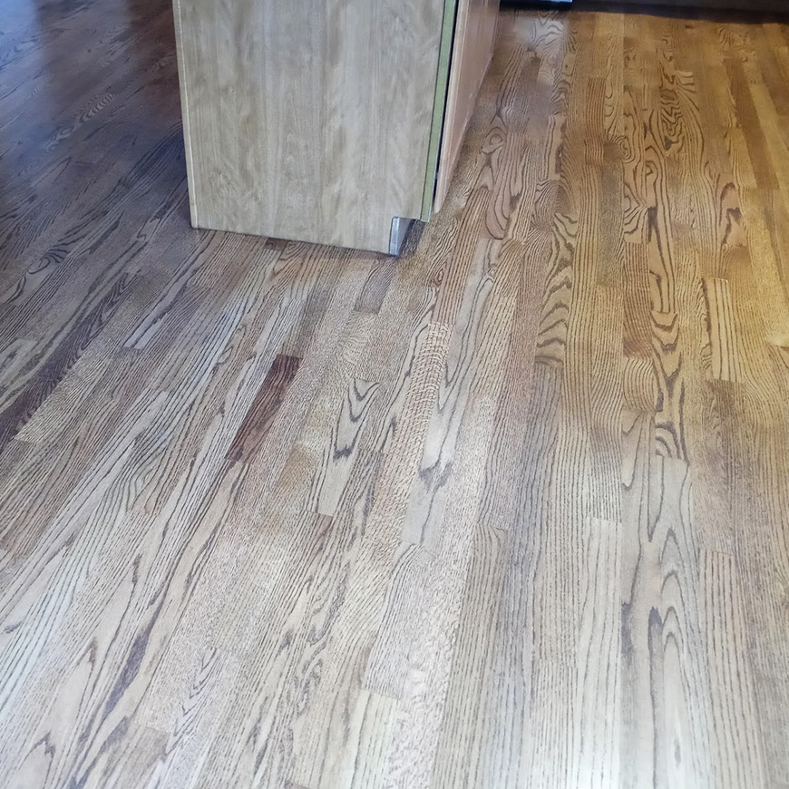 kitchen floor looking brand new after refinishing