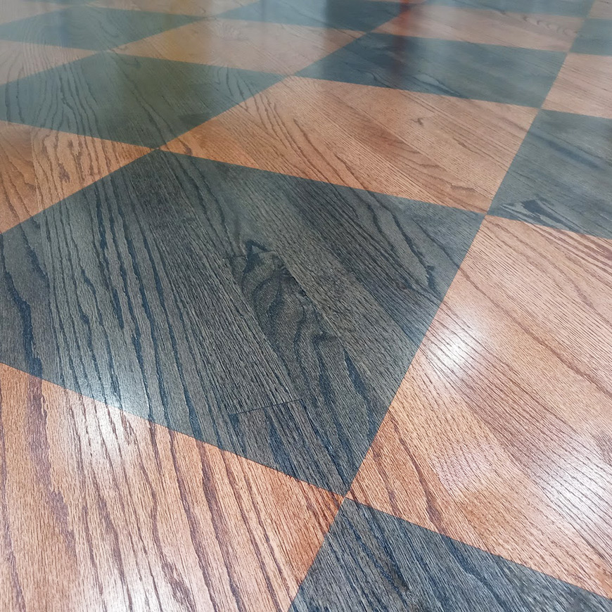 close up detail of checkered wood floor