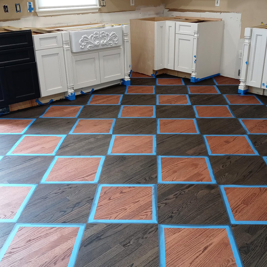 dark stain applied to squares