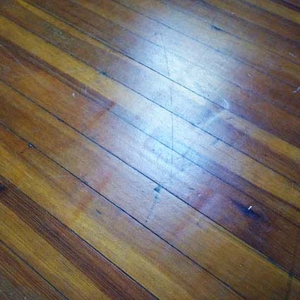 drum marks in badly sanded wood floor