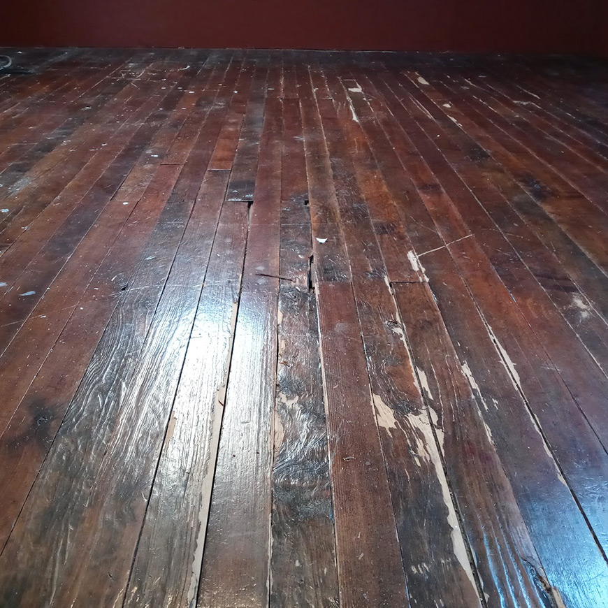 splintered section of pine floor