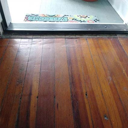 ugly damaged entrance hardwood floor